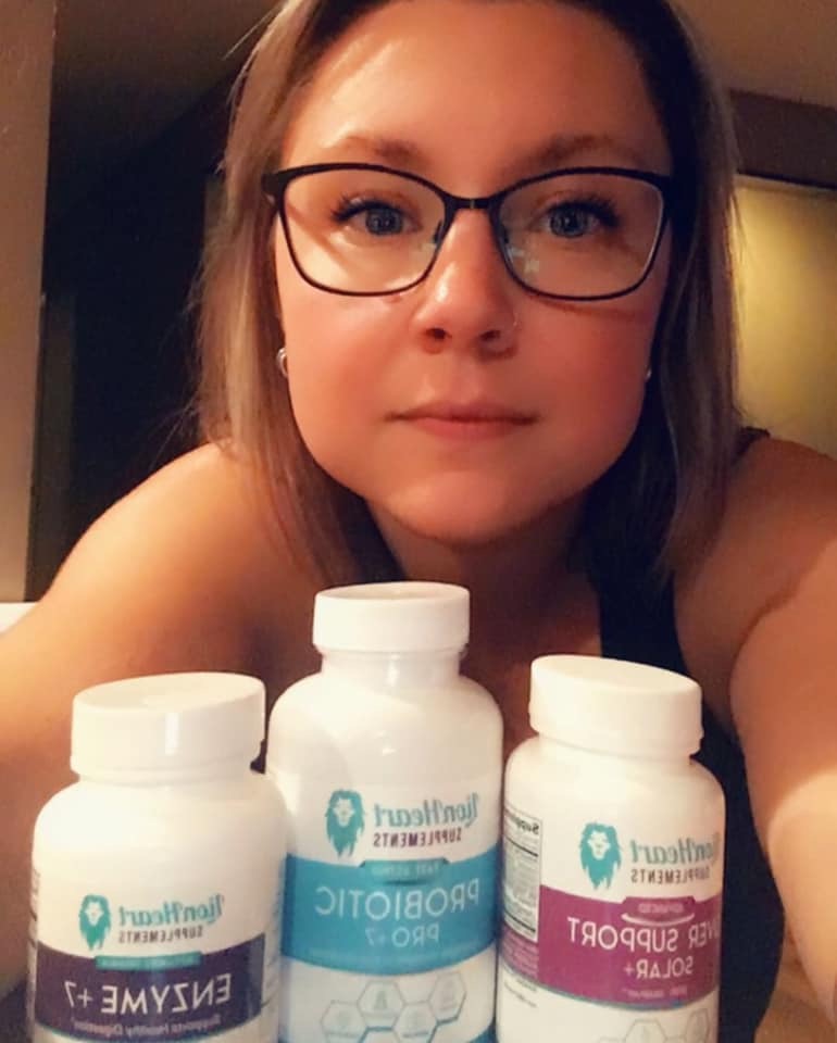 Melinda G. holding LionHeart Enzyme + 7