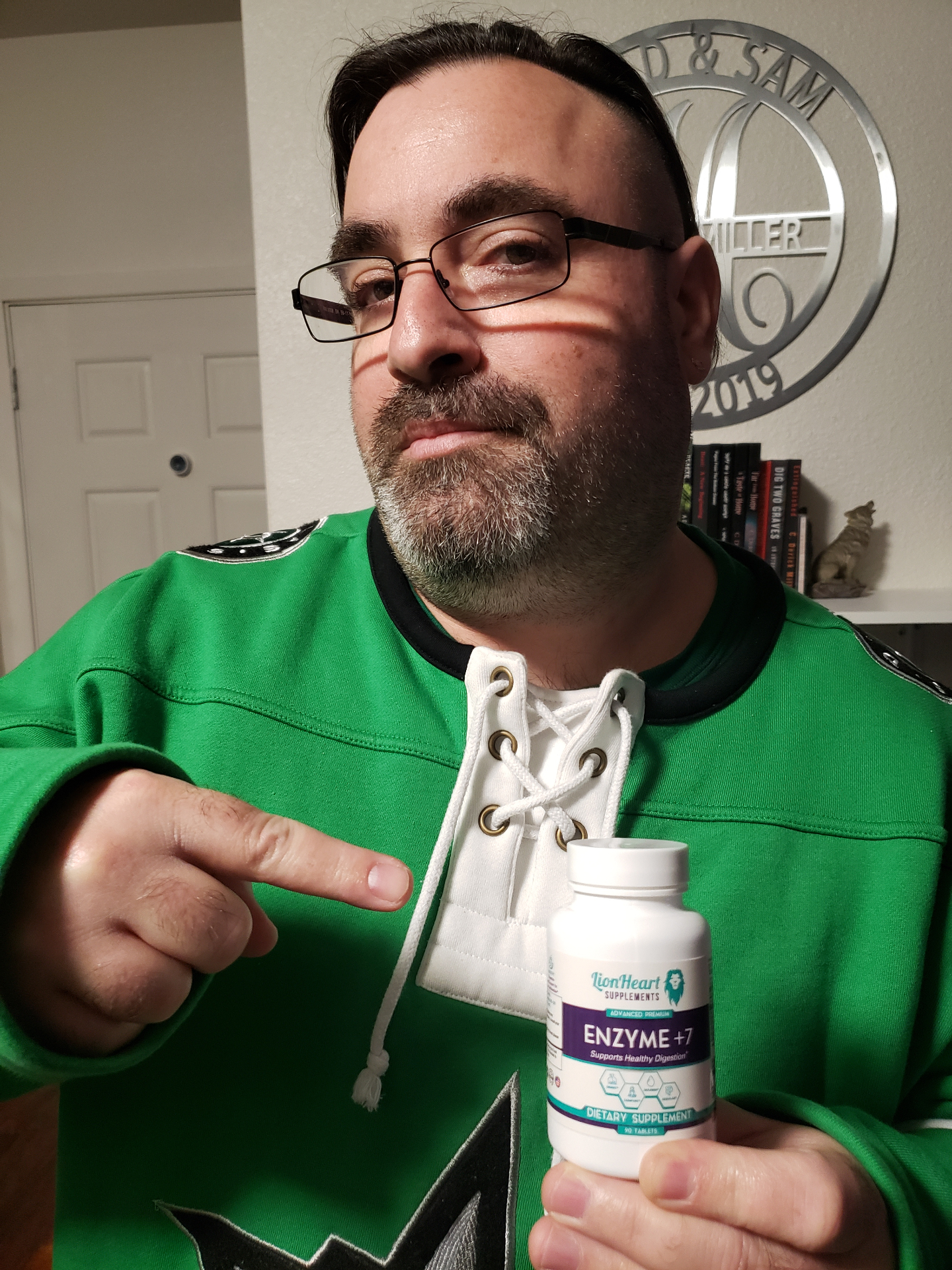 Brad M. holding LionHeart Enzyme + 7