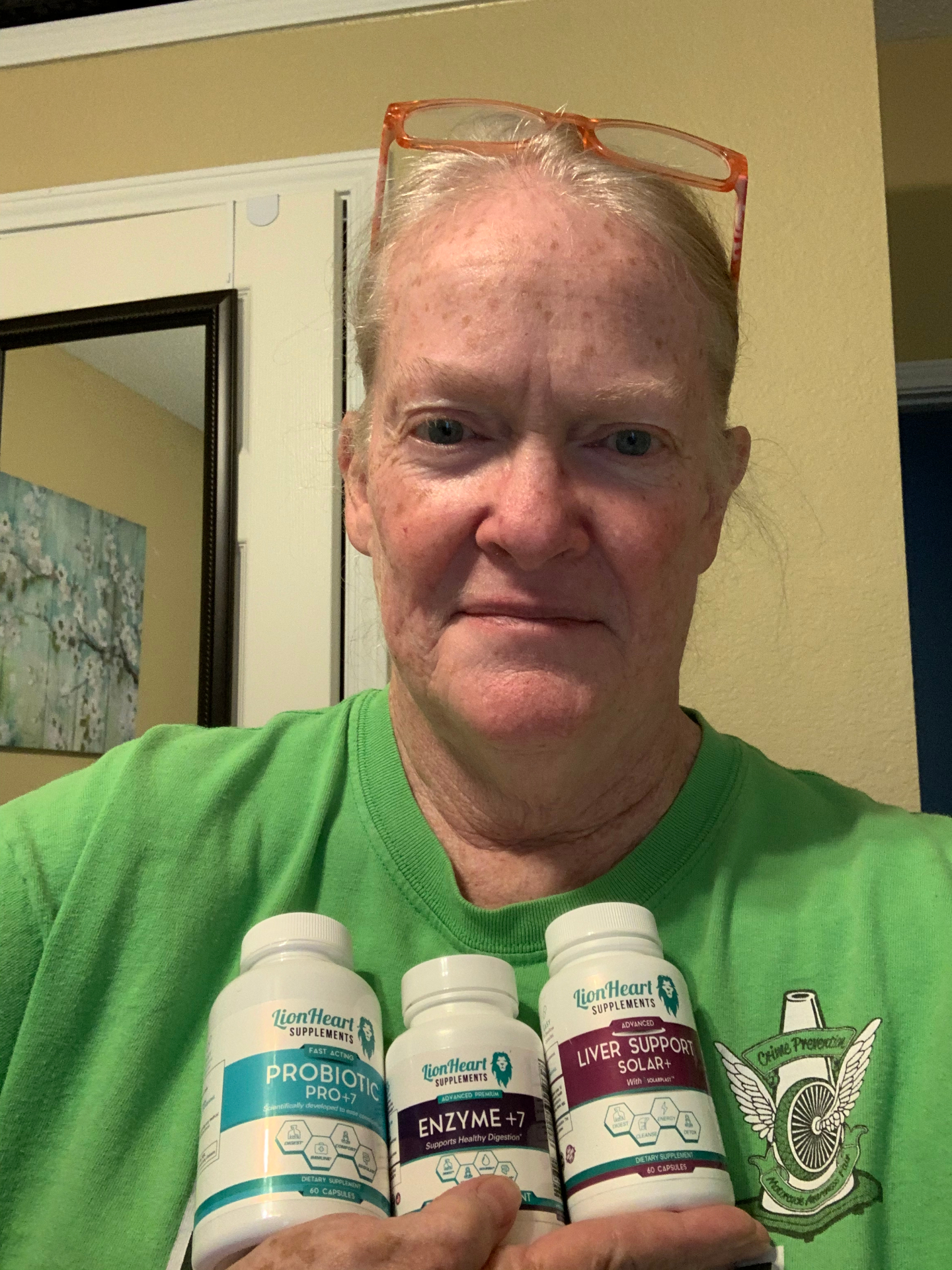 Dora S. holding LionHeart Enzyme + 7